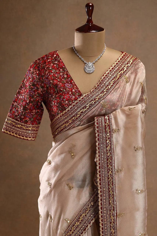 FANTABULOUS BEIGE JIMMY CHOO SILK SAREE WITH POSH BLOUSE PIECE