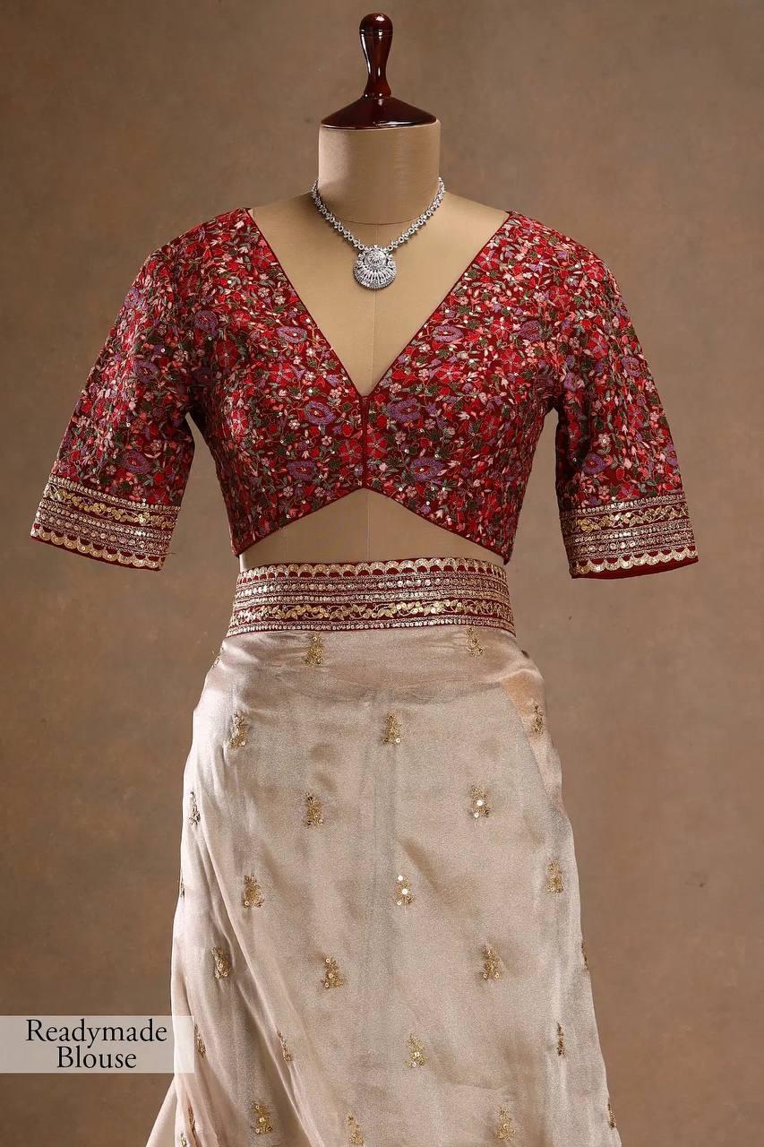 FANTABULOUS BEIGE JIMMY CHOO SILK SAREE WITH POSH BLOUSE PIECE