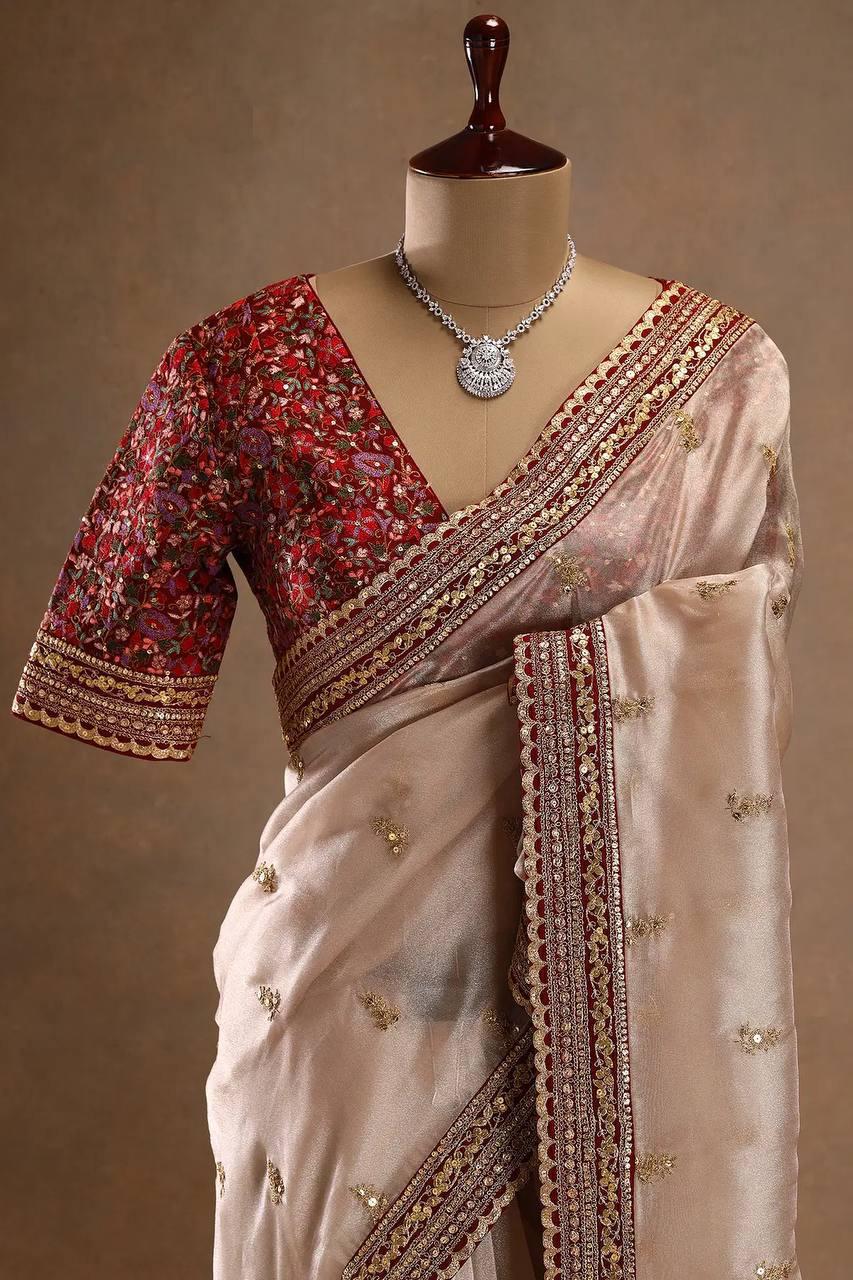 FANTABULOUS BEIGE JIMMY CHOO SILK SAREE WITH POSH BLOUSE PIECE