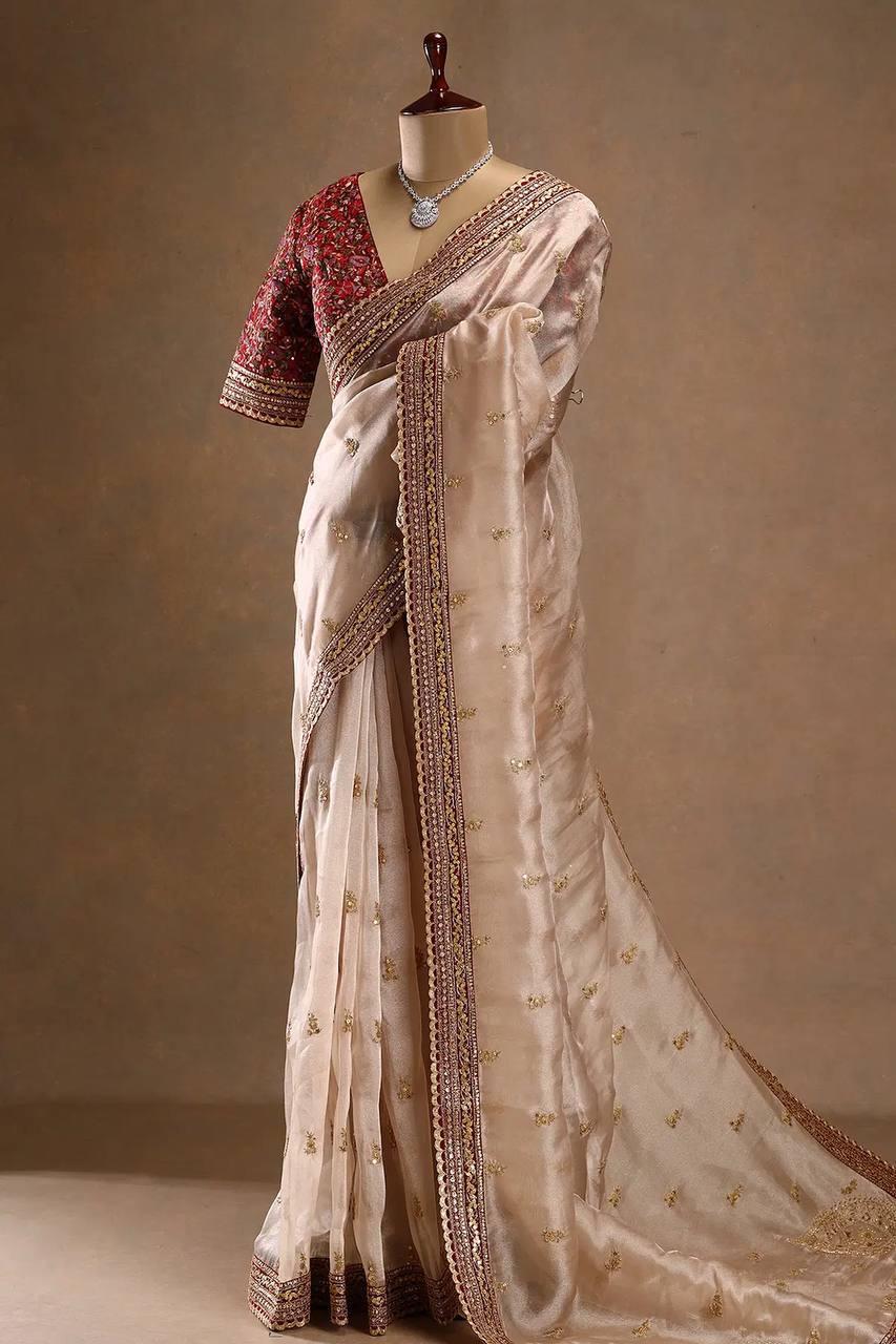 FANTABULOUS BEIGE JIMMY CHOO SILK SAREE WITH POSH BLOUSE PIECE
