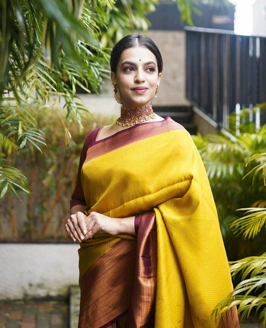 Lemon Yellow Kanjivaram Saree With Maroon Border and Heavy Brocade Blouse