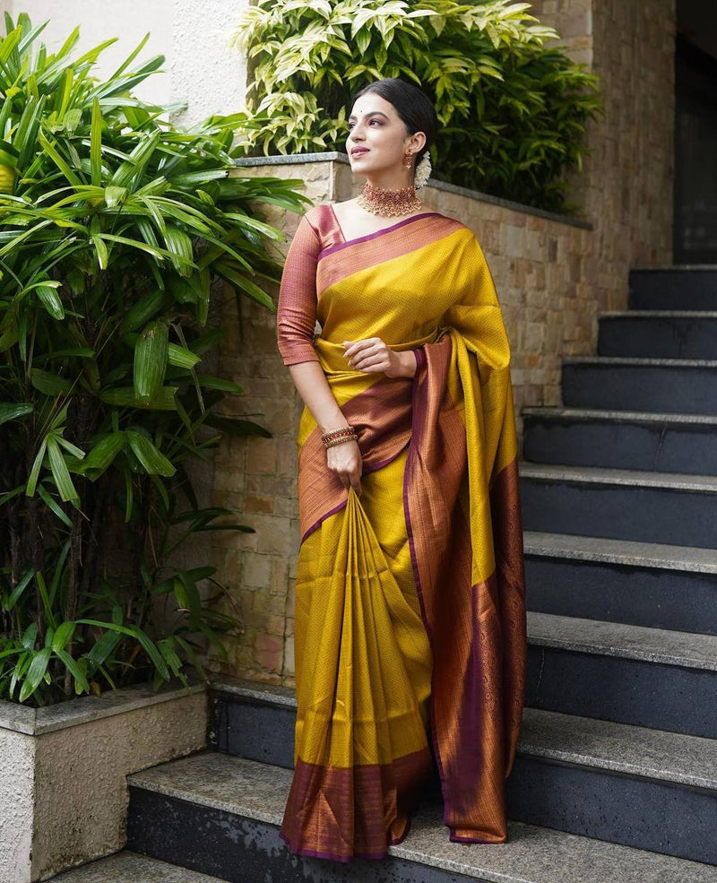 Lemon Yellow Kanjivaram Saree With Maroon Border and Heavy Brocade Blouse