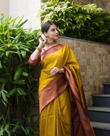 Lemon Yellow Kanjivaram Saree With Maroon Border and Heavy Brocade Blouse