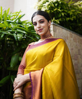 Lemon Yellow Kanjivaram Saree With Maroon Border and Heavy Brocade Blouse