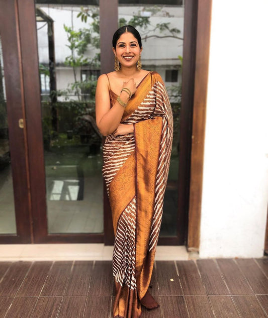 Shine Brown Soft Silk Saree In Laheriya Pattern With Heavy Blouse Piece