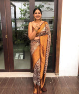 Shine Brown Soft Silk Saree In Laheriya Pattern With Heavy Blouse Piece